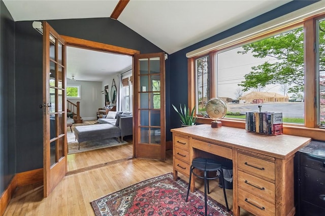 314 Hamilton St, Benton, NY 14527 - office area featuring french doors, lofted ceiling, light wood-type flooring, and baseboards