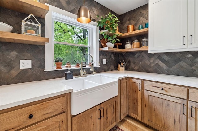 314 Hamilton St, Benton, NY 14527 - kitchen with open shelves, a sink, tasteful backsplash, and light countertops