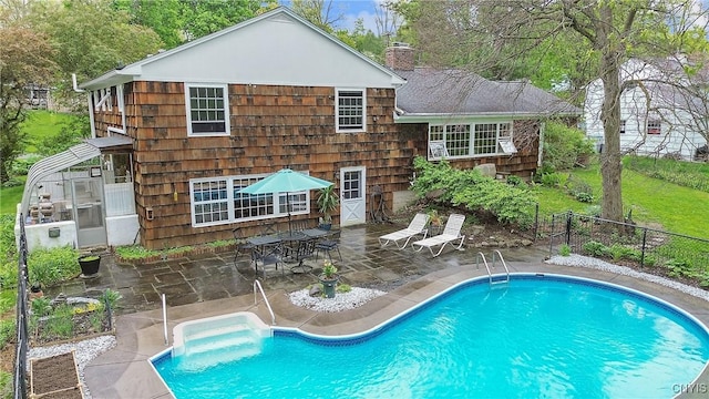 9 Bishop Dr, Manlius, NY 13066 - back of house with a patio, fence, and a chimney