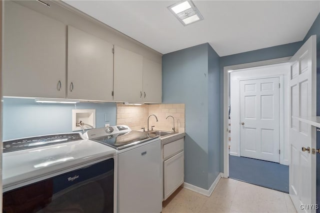 9 Bishop Dr, Manlius, NY 13066 - clothes washing area featuring cabinet space, washing machine and dryer, baseboards, and light flooring