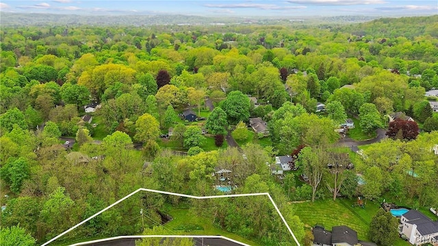 9 Bishop Dr, Manlius, NY 13066 - aerial overview of property's location with property boundaries highlighted and a heavily wooded area