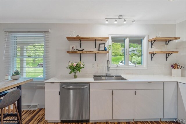 9 Bishop Dr, Manlius, NY 13066 - kitchen with dishwasher, open shelves, a sink, light countertops, and ornamental molding