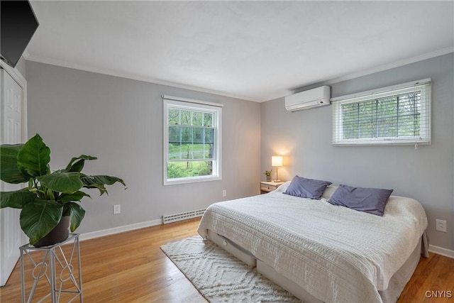 9 Bishop Dr, Manlius, NY 13066 - bedroom with a wall mounted air conditioner, light wood-style floors, baseboards, ornamental molding, and a baseboard heating unit