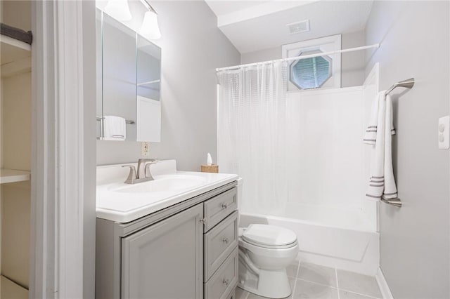 full bathroom featuring tile patterned flooring, shower / bathtub combination with curtain, vanity, and toilet