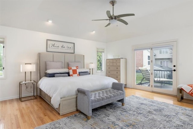 bedroom featuring access to exterior, multiple windows, light wood-style flooring, ceiling fan, and recessed lighting