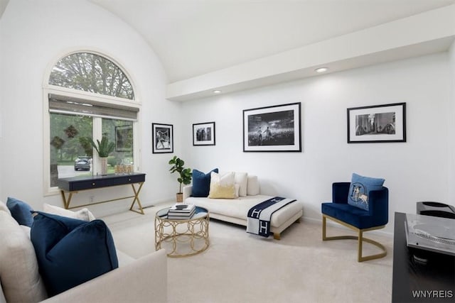 living area featuring lofted ceiling, carpet, baseboards, and recessed lighting