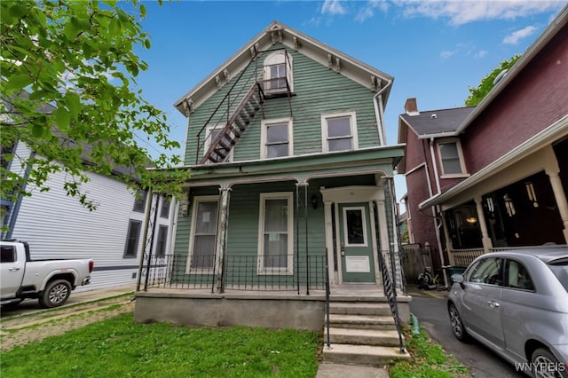72 Mariner St, Buffalo, NY 14201 - view of front facade featuring a porch