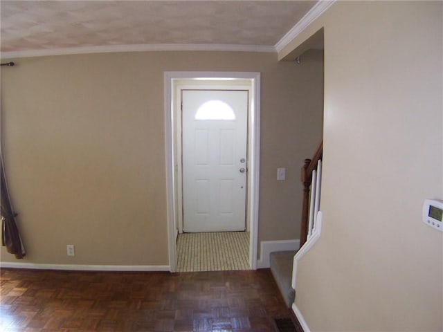 entrance foyer with stairs and baseboards