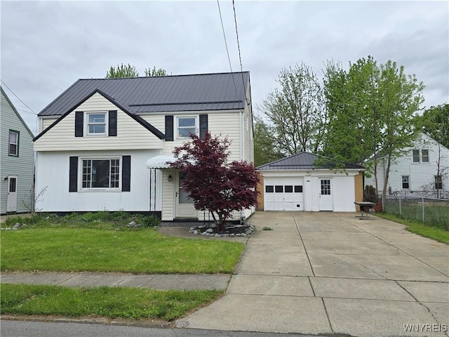56 Gibbons St, Lackawanna, NY 14218 - traditional home with a garage, an outbuilding, metal roof, and driveway