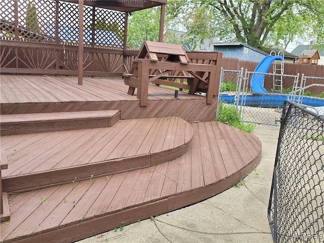 56 Gibbons St, Lackawanna, NY 14218 - wooden terrace with a fenced backyard