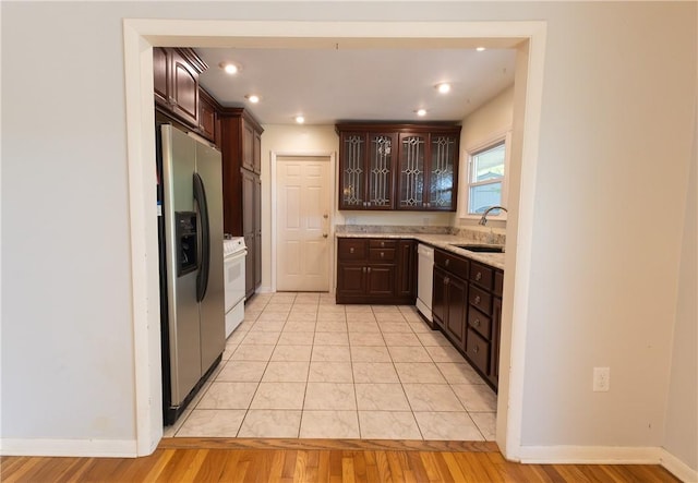 100 Parkview Dr, Erwin, NY 14870 - kitchen featuring white appliances, dark brown cabinets, a sink, light wood-style flooring, and recessed lighting