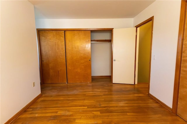 100 Parkview Dr, Erwin, NY 14870 - unfurnished bedroom featuring wood finished floors, a closet, and baseboards