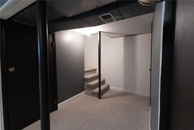 100 Parkview Dr, Erwin, NY 14870 - finished basement with carpet flooring, baseboards, and stairway