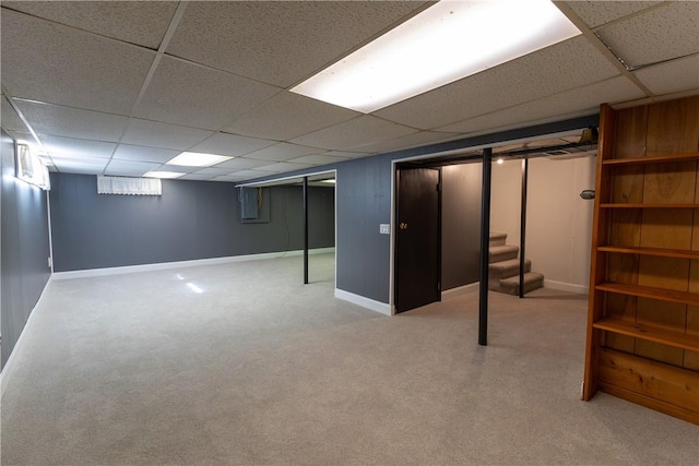 100 Parkview Dr, Erwin, NY 14870 - finished below grade area with a paneled ceiling, stairs, baseboards, and carpet floors