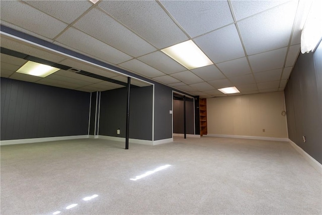 100 Parkview Dr, Erwin, NY 14870 - finished below grade area with carpet flooring, a paneled ceiling, and baseboards