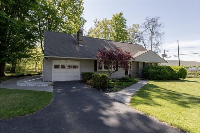 100 Parkview Dr, Erwin, NY 14870 - view of front of property featuring an attached garage, asphalt driveway, a front yard, and a chimney