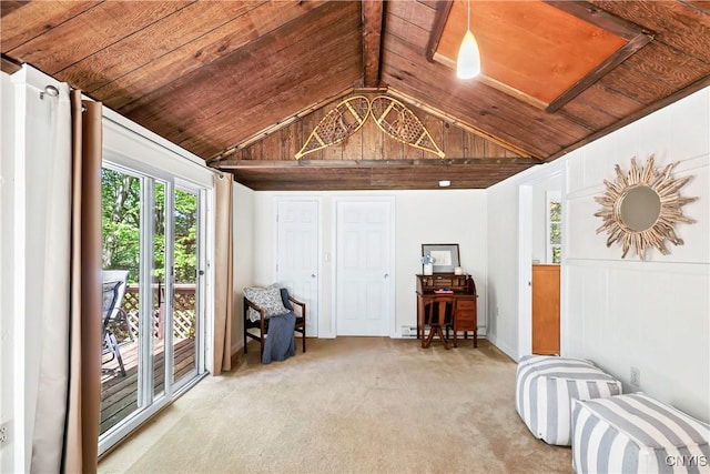 living area featuring lofted ceiling, wooden ceiling, and carpet flooring