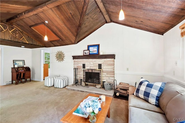living area featuring wood ceiling, a fireplace, and carpet flooring