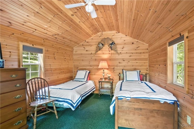 bedroom with vaulted ceiling, carpet, wooden walls, wooden ceiling, and ceiling fan