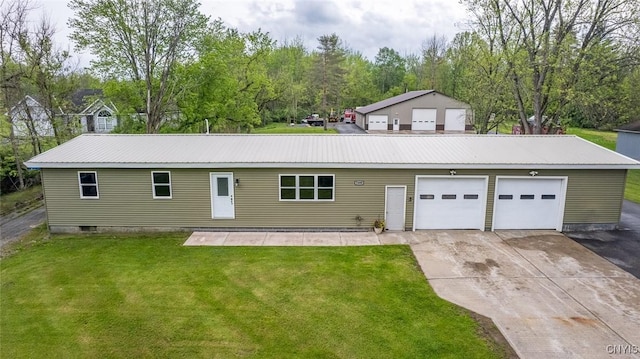 7498 Roberts St, Lenox, NY 13032 - view of front of house with a front lawn, driveway, and metal roof