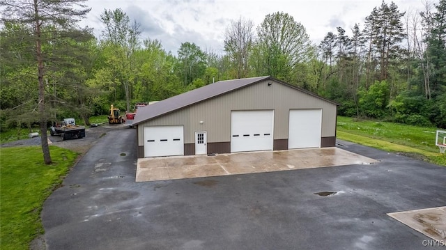 7498 Roberts St, Lenox, NY 13032 - detached garage with a forest view