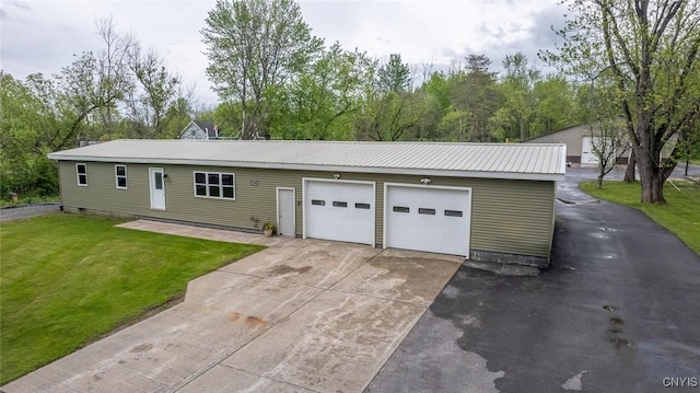 7498 Roberts St, Lenox, NY 13032 - view of front of property with concrete driveway, a front yard, and a metal roof