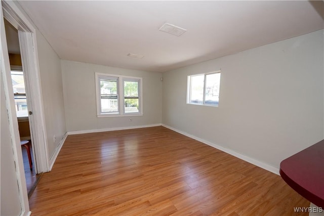 2282 Seneca St, Buffalo, NY 14210 - empty room featuring light wood finished floors and baseboards