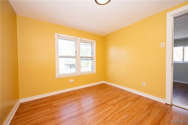 2282 Seneca St, Buffalo, NY 14210 - empty room with light wood-style floors and baseboards