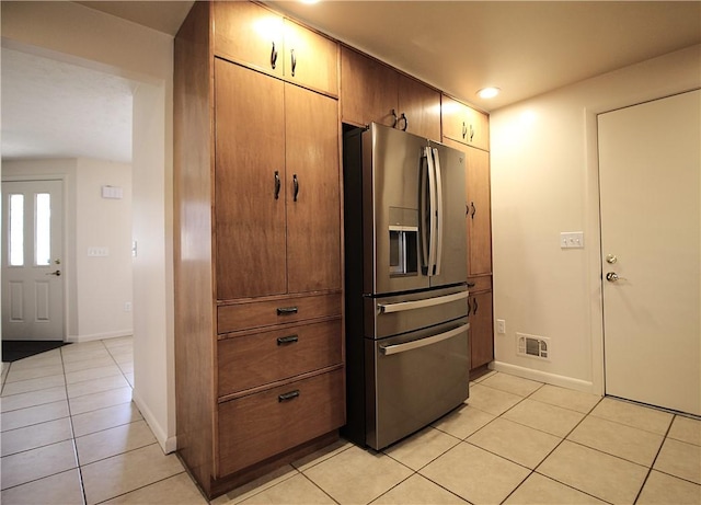 31 Jefreelind Dr, Greece, NY 14616 - kitchen with stainless steel fridge, light tile patterned flooring, baseboards, and recessed lighting