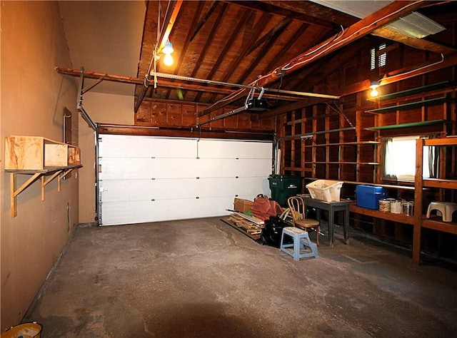 31 Jefreelind Dr, Greece, NY 14616 - garage featuring a garage door opener