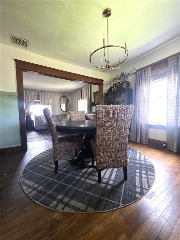 119 Verona St, Elmira, NY 14903 - dining space featuring a chandelier and hardwood / wood-style flooring