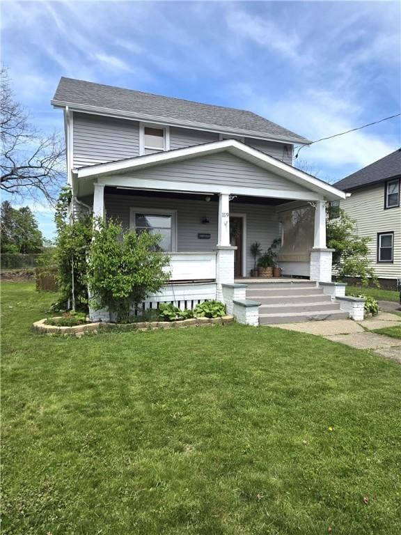 119 Verona St, Elmira, NY 14903 - view of front of property featuring a porch, a front lawn, and a shingled roof