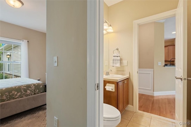 119 Star Gaze Cir, Manlius, NY 13066 - ensuite bathroom with tile patterned floors, vanity, and toilet