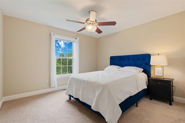 119 Star Gaze Cir, Manlius, NY 13066 - bedroom with baseboards, light colored carpet, and a ceiling fan