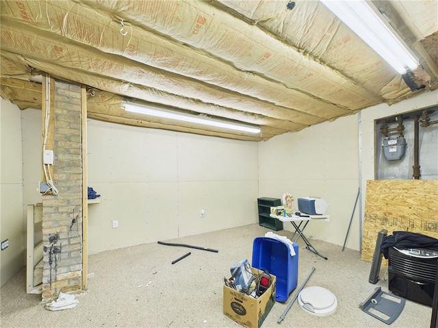 unfinished basement with gas meter
