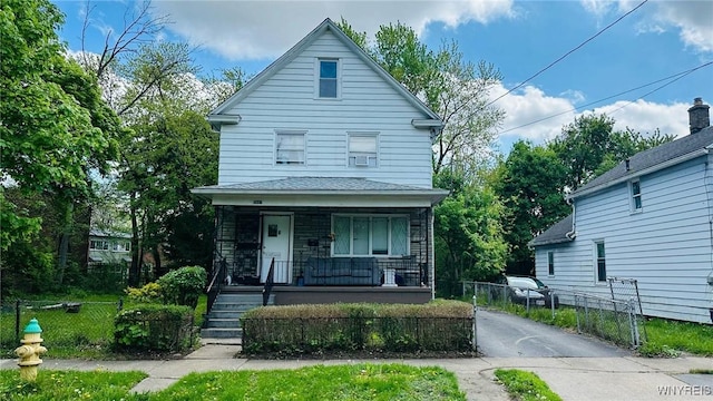 2817 10th St, Niagara Falls, NY 14305 - traditional style home with a porch and fence