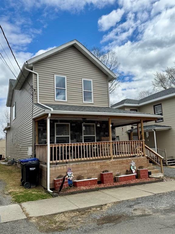 426 Loder St, Barton, NY 14892 - view of front facade with a porch