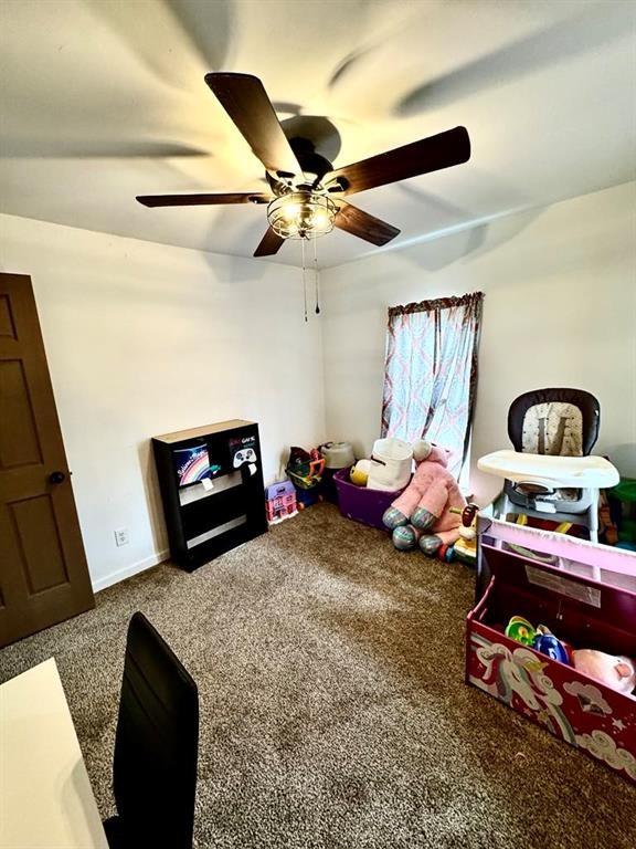 426 Loder St, Barton, NY 14892 - game room featuring carpet floors, a ceiling fan, and baseboards