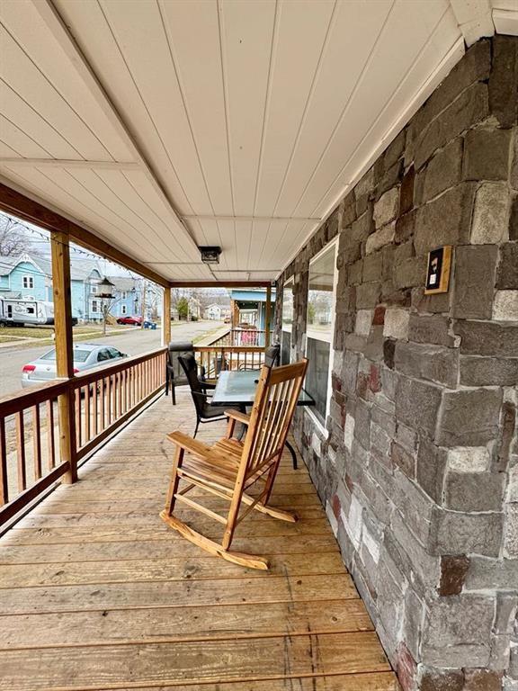 426 Loder St, Barton, NY 14892 - wooden terrace featuring a porch