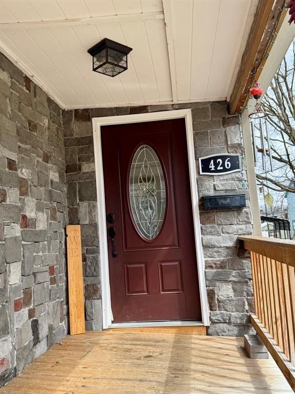 426 Loder St, Barton, NY 14892 - entrance to property with stone siding
