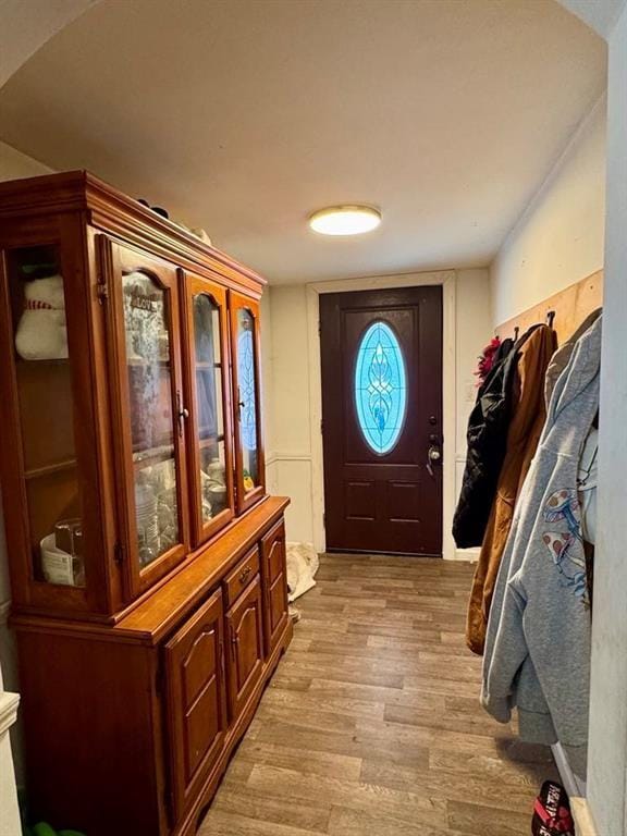 426 Loder St, Barton, NY 14892 - foyer featuring light wood finished floors and arched walkways