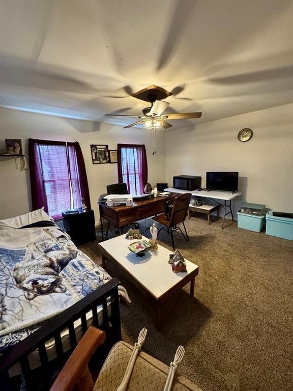 426 Loder St, Barton, NY 14892 - bedroom with carpet, a ceiling fan, and an office area