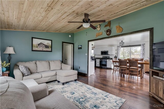 36852 Middle Rd, Orleans, NY 13656 - living area with vaulted ceiling, a ceiling fan, wooden ceiling, and dark wood finished floors