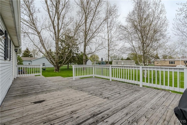 36852 Middle Rd, Orleans, NY 13656 - deck featuring a lawn and an outbuilding