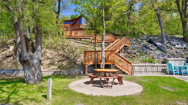 1267 S Lake Rd, Middlesex, NY 14507 - view of grassy yard with a deck, stairway, and a patio