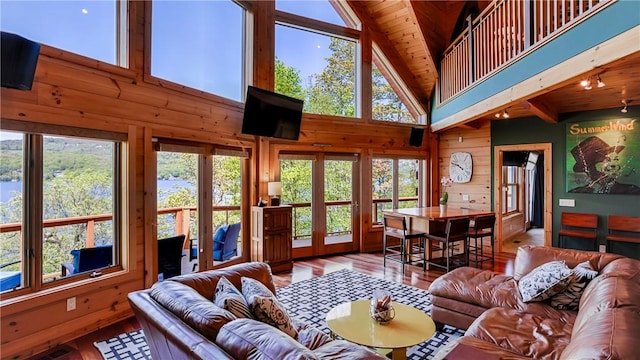 1267 S Lake Rd, Middlesex, NY 14507 - living area featuring french doors, hardwood / wood-style floors, high vaulted ceiling, wooden ceiling, and healthy amount of natural light