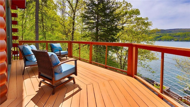 1267 S Lake Rd, Middlesex, NY 14507 - wooden deck with a water view