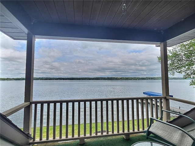 deck featuring a water view