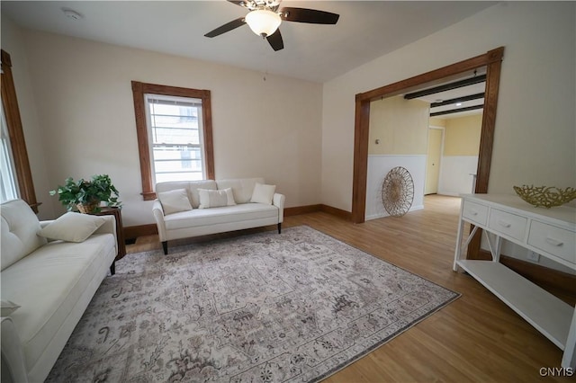 11 White St, Kirkland, NY 13323 - living area with ceiling fan, baseboards, and wood finished floors