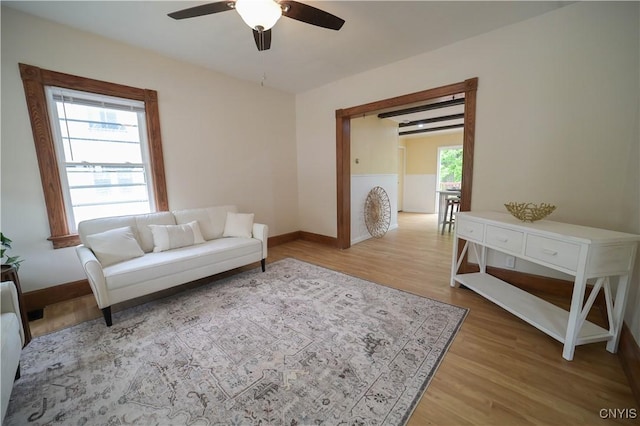 11 White St, Kirkland, NY 13323 - living area featuring ceiling fan, wood finished floors, and baseboards